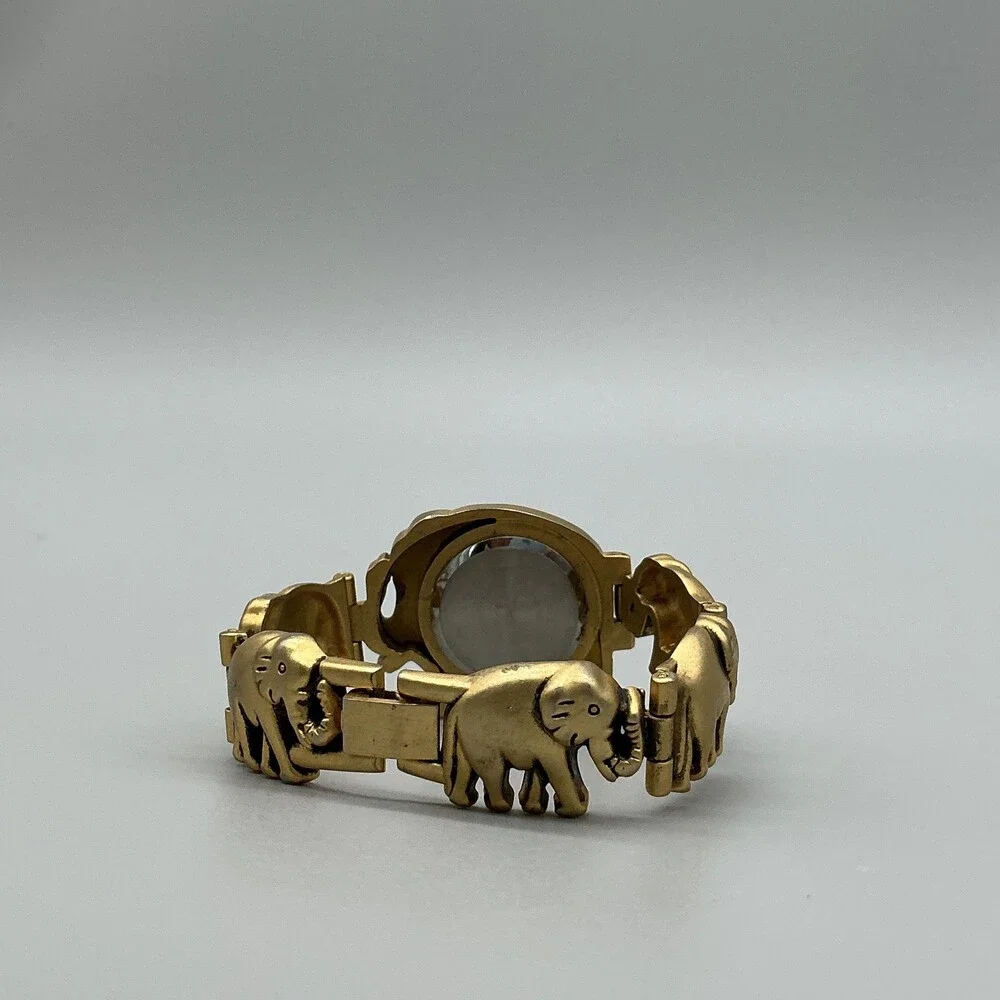 Womens Watch 31mm White Dial Gold Tone Elephant Bracelet New Battery 6.5